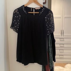 Black top with sleeve detail